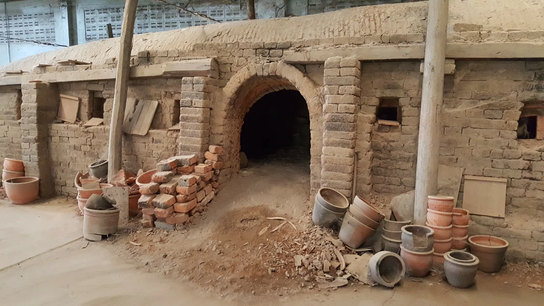 Traditional brick wood-fired pottery kiln in Thailand
